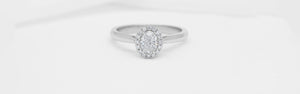Halo Diamond Engagement Ring highlights a dazzling centre diamond