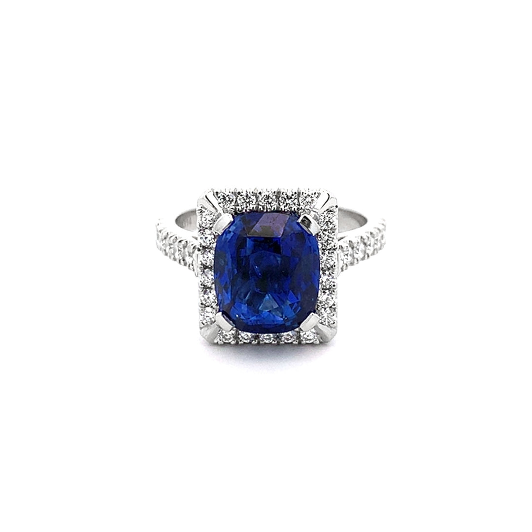Blue Sapphire and Diamond Halo Ring in Platinum – The