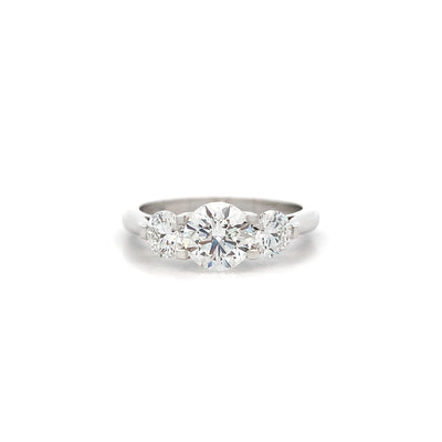 Lotus: Brilliant Cut Diamond Three Stone Ring in Platinum | 1.50ctw