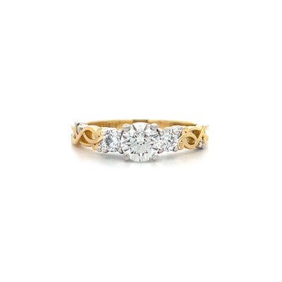 Traces: Brilliant Cut Diamond Three Stone Ring in Yellow Gold | 0.78ctw
