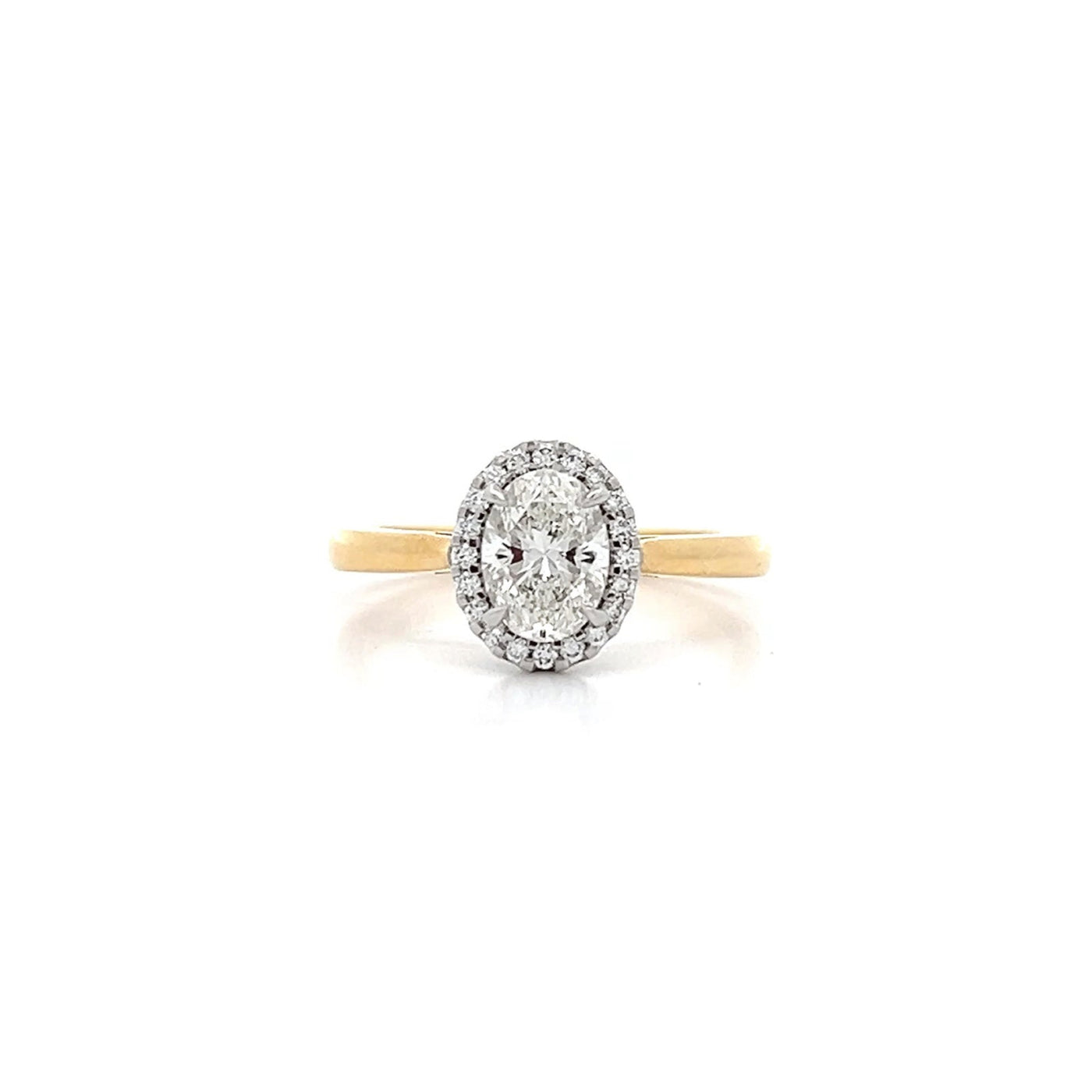 Luminous: Oval Cut Diamond Halo Ring in Yellow Gold | 1.02ctw