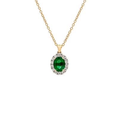 Oval Cut Emerald and Diamond Halo Pendant in Yellow Gold and Platinum | 2.24ctw

