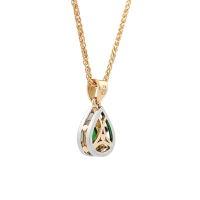 Aurelia: Emerald and Diamond Halo Drop Pendant in Platinum and Yellow Gold | 1.08ctw