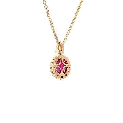 Oval Cut Ruby and Diamond Halo Pendant in Yellow Gold | 1.76ctw
