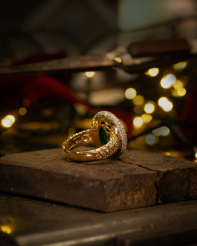 Cleo: Zambian Emerald and Diamond Halo Ring with Diamond Detailed Shoulders in Yellow Gold | 8.30ct
