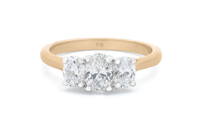 Enchant: Oval Cut Diamond Three Stone Ring