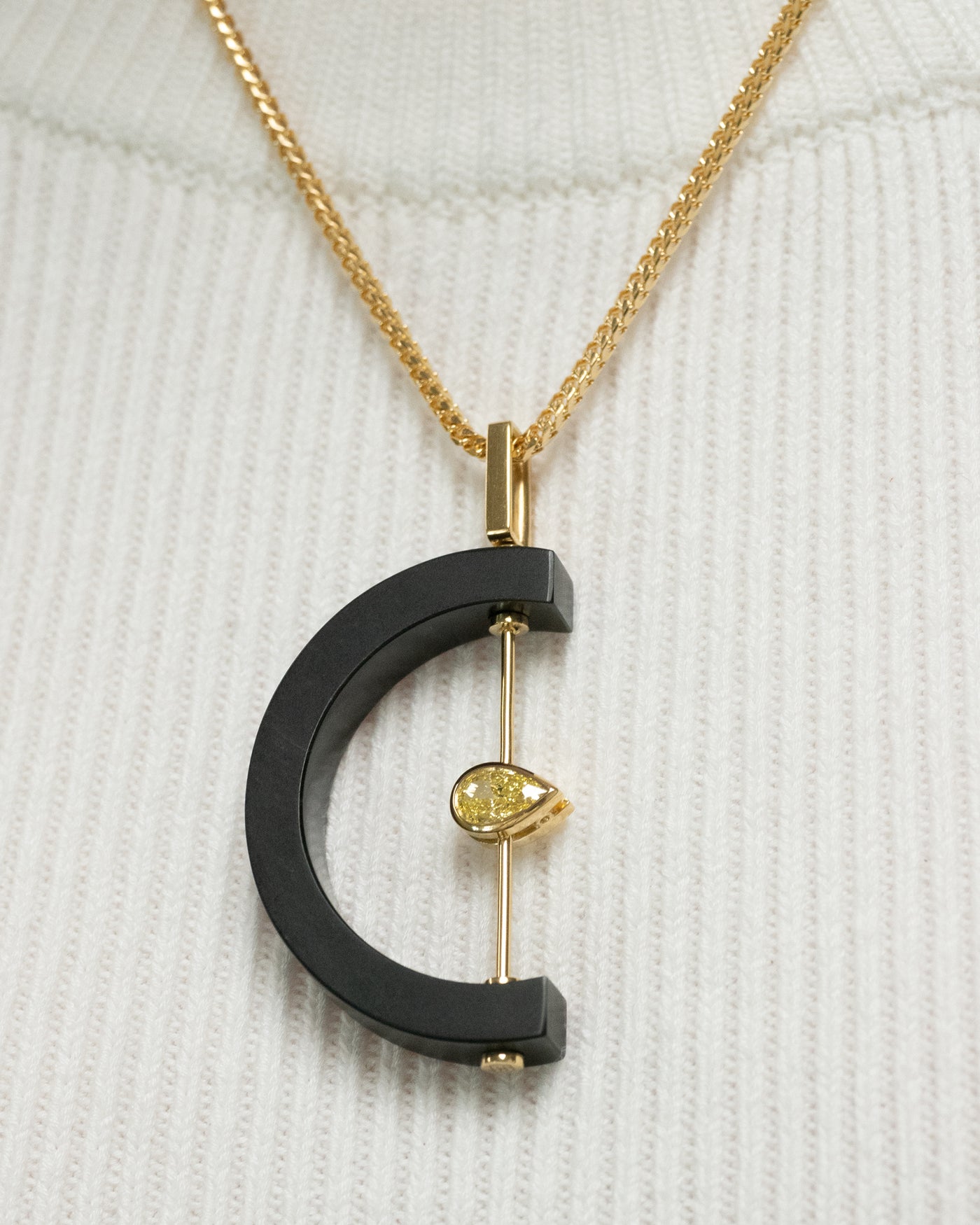 Now you C it, now you don't: Yellow Diamond and Black Jade Pendant | 0.73ct