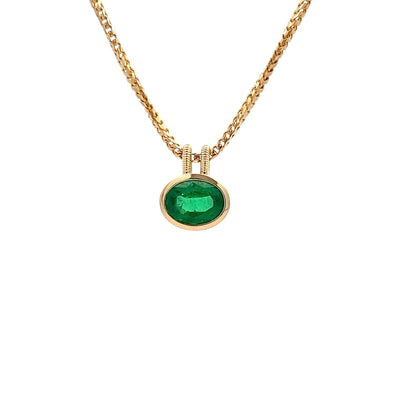 Bezel Set Oval Cut Emerald Pendant in Yellow Gold | 1.69ct
