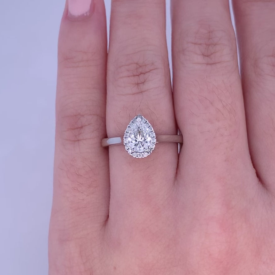 Luminous: Pear Cut Diamond Halo Ring