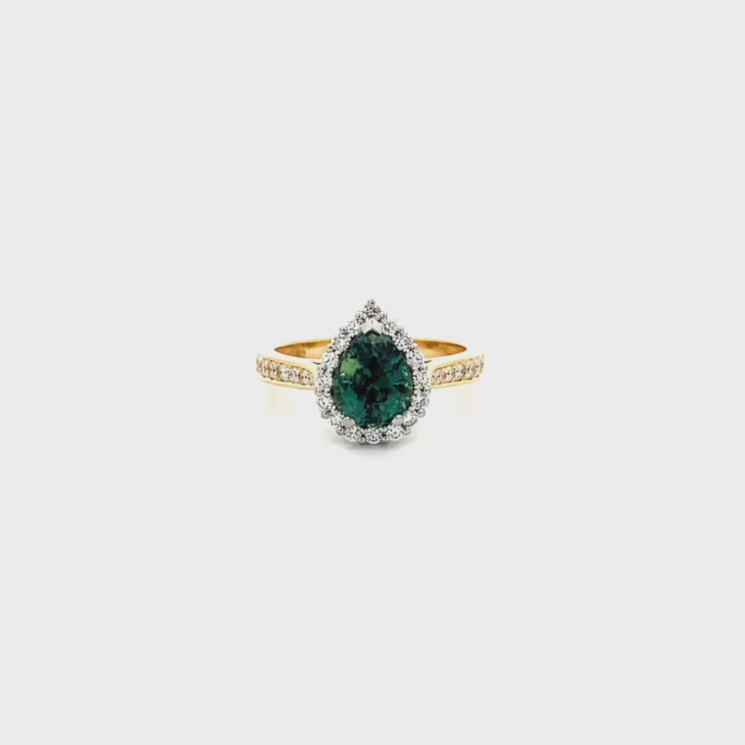 In a Pear Tree: Teal Sapphire & Diamond Halo Ring in Yellow Gold