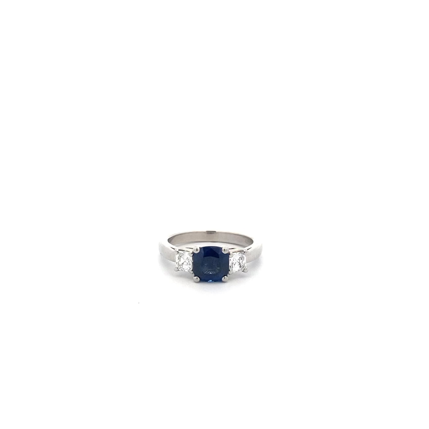 Blue Sapphire and Diamond Three Stone Ring