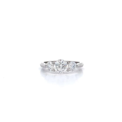 Lotus: Brilliant Cut Diamond Three Stone Ring in Platinum | 1.50ctw