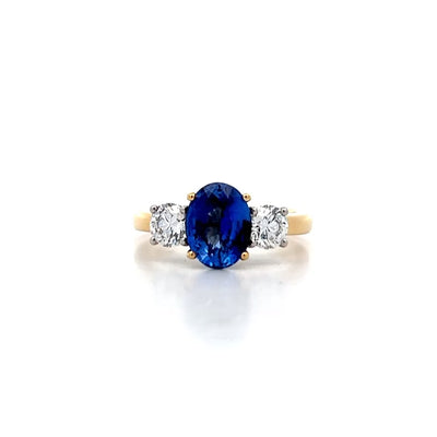 Ceylon Blue Sapphire and Diamond Three Stone Ring in Yellow Gold | 3.16ctw