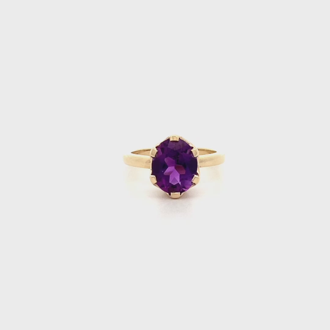 Oval Cut Amethyst Solitaire Ring in Yellow Gold