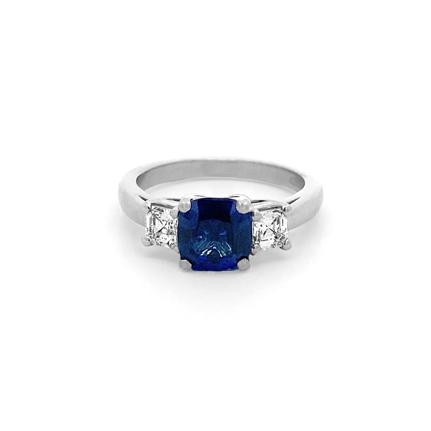 Blue Sapphire and Diamond Three Stone Ring