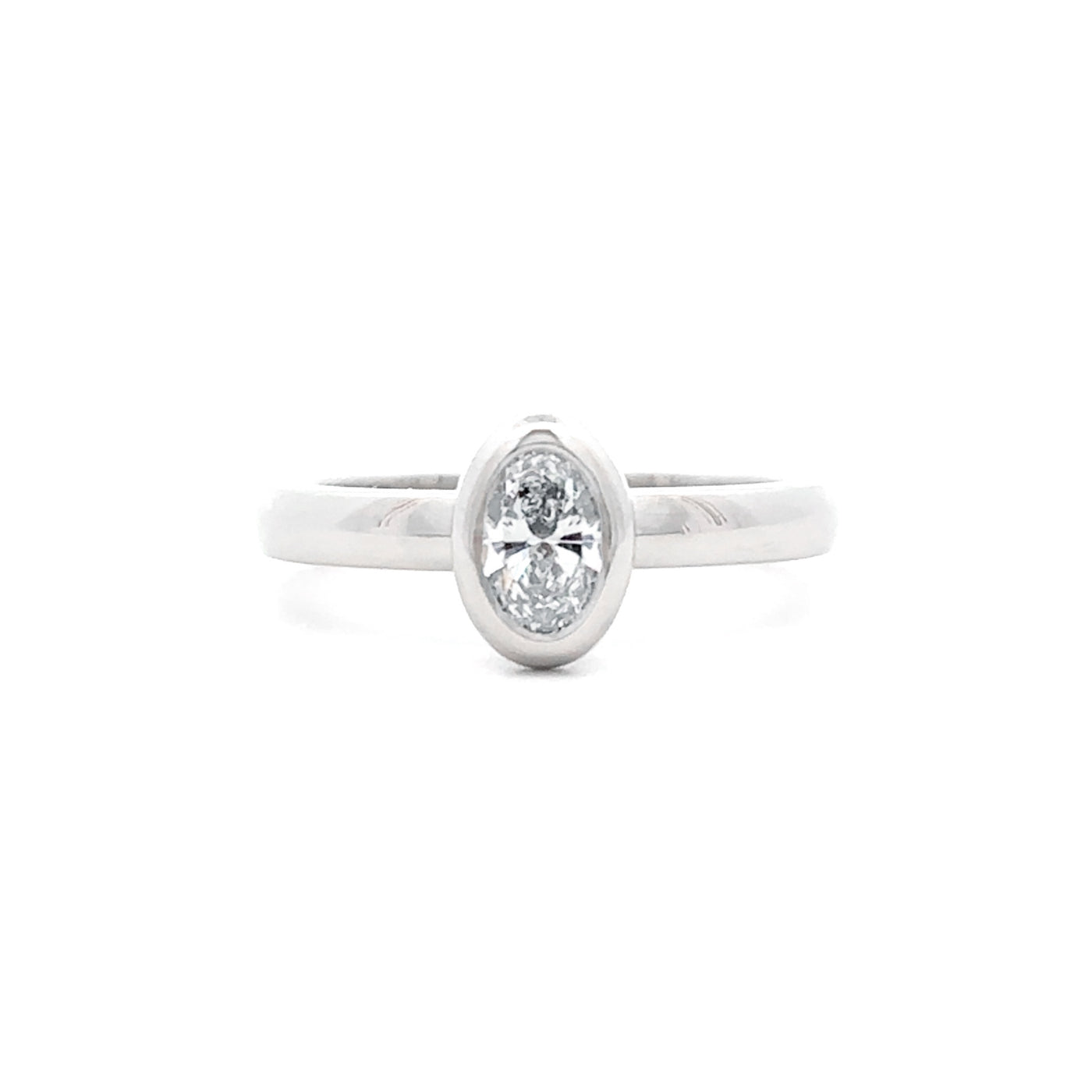 Bezel Set Oval Cut Diamond Solitaire Ring in Platinum | 0.50ct F VS1