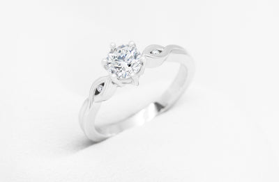 Takai: Brilliant Cut Diamond Solitaire Ring in Platinum | 0.712ctw