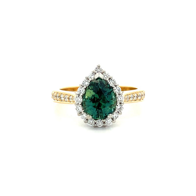 In a Pear Tree: Teal Sapphire & Diamond Halo Ring in Yellow Gold