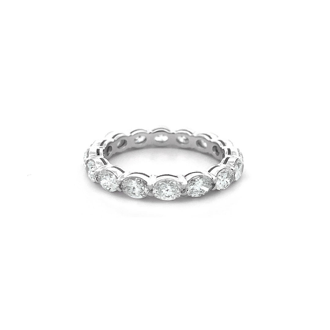 East-West Oval Cut Diamond Eternity Ring in Platinum