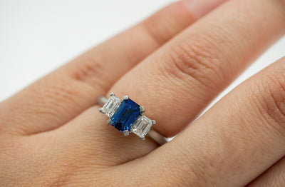 Blue Sapphire and Diamond Three Stone Ring